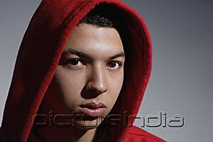 PictureIndia - young man wearing red hooded sweatshirt