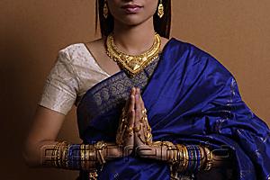 PictureIndia - Indian woman with hands held in prayer position