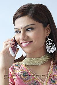 PictureIndia - Young Indian woman on mobile phone