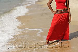 PictureIndia - woman standing on beach