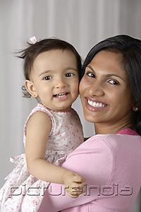 PictureIndia - woman carrying baby