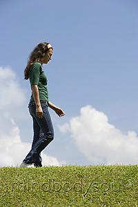 Mind Body Soul - Teen girl walking on grass