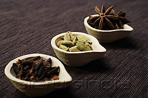 PictureIndia - Indian spices in clay pots.