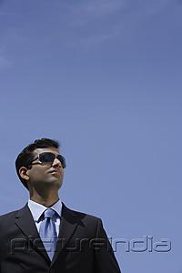 PictureIndia - Indian businessman wearing sunglasses outside