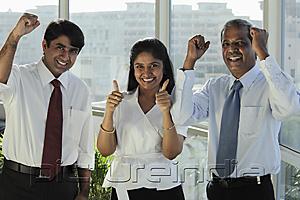 PictureIndia - Three Indian people smiling making hand gestures