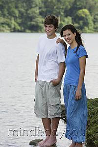 Mind Body Soul - Teen couple standing in lake