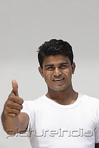 PictureIndia - Man with thumbs up smiling