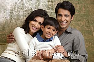 Asia Images Group - family of three smiling at camera (horizontal)
