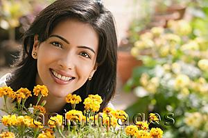 Asia Images Group - woman with flowers (horizontal)