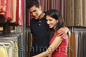 Asia Images Group - couple shopping for fabric