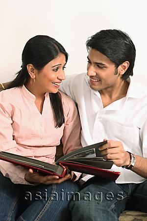 Asia Images Group - Husband and wife reading book