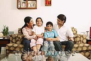 Asia Images Group - Family on couch