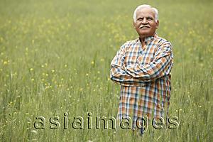 Asia Images Group - Farmer in field