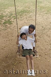 Asia Images Group - father and son in swing