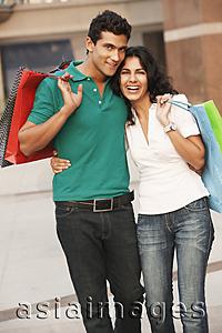 Asia Images Group - couple with shopping bags