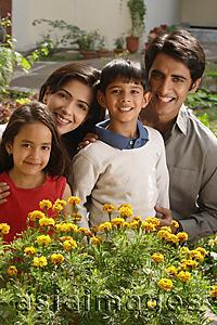 Asia Images Group - family of four with flowers