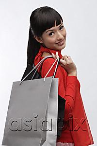 AsiaPix - Young woman with shopping bags
