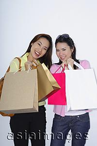 Asia Images Group - two woman with shopping bags