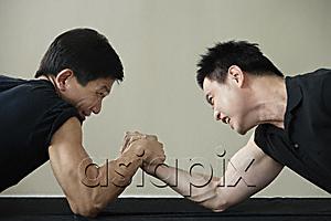 AsiaPix - Two men arm wrestling