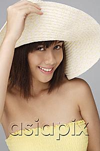 AsiaPix - Young woman with big sun hat