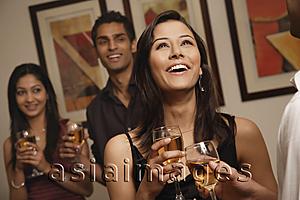 Asia Images Group - woman at party laughing