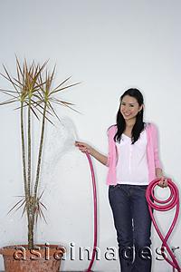 Asia Images Group - woman with pink hose