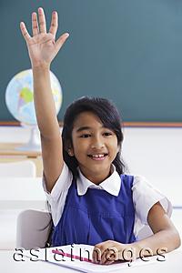 Asia Images Group - girl raises hand in class
