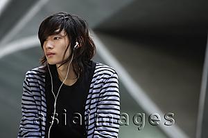Asia Images Group - young man listening to music
