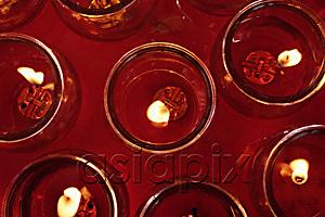 AsiaPix - Close up of candles at temple altar