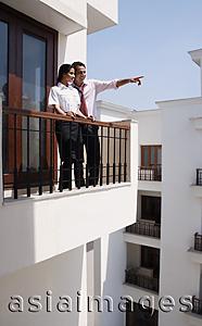 Asia Images Group - young couple on balcony