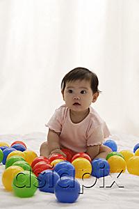 AsiaPix - Baby girl playing with balls