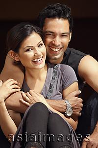Asia Images Group - embracing couple, smiling