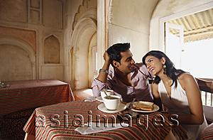 Asia Images Group - couple having coffee, chatting