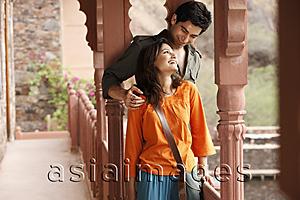 Asia Images Group - couple standing on balcony