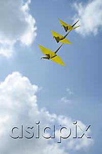 AsiaPix - 3 yellow paper cranes against sky backdrop