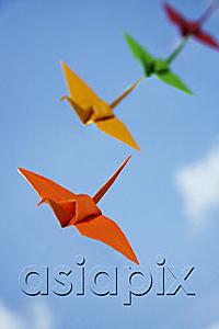 AsiaPix - multiple paper cranes against sky backdrop