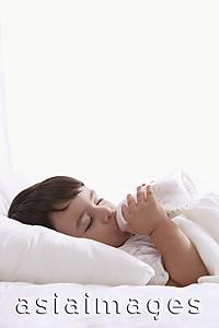 Asia Images Group - baby boy, asleep with bottle