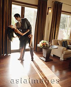 Asia Images Group - couple dancing at home