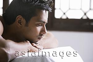 Asia Images Group - young man relaxing on a massage table