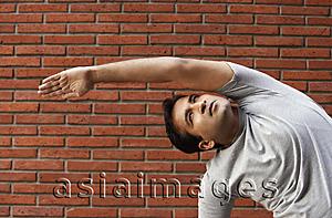 Asia Images Group - man stretching