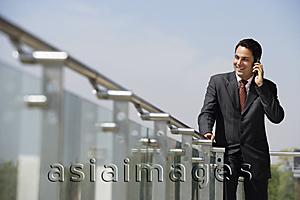 Asia Images Group - businessman talking on mobile phone