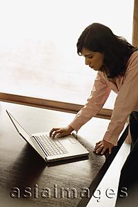 Asia Images Group - businesswoman at laptop computer