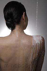 Mind Body Soul - Milk being poured down a woman's back