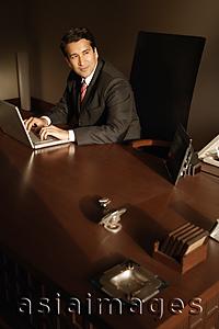 Asia Images Group - businessman on laptop computer
