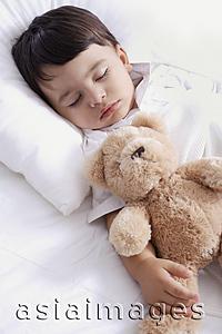 Asia Images Group - baby boy sleeping with teddy bear