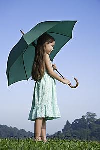 Mind Body Soul - young girl with bright green umbrella