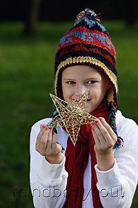 Mind Body Soul - young girl wearing hat and holding star