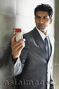 Asia Images Group - businessman using mobile phone