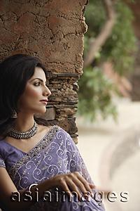 Asia Images Group - young serious woman in sari