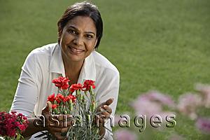 Asia Images Group - woman gardening